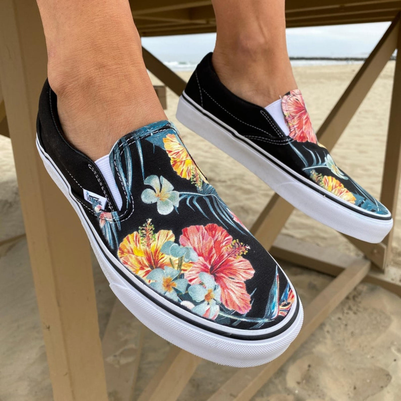 Tropical Floral Pattern on Black Vans Slip On Shoes